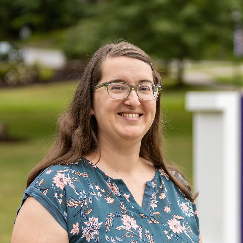 Portrait of Alison Young Reusser standing on ����ר��'s campus.