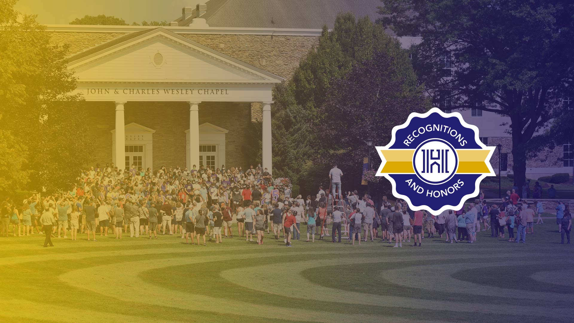 Houghton UniversityCollege Recognitions - Students and parents gathered in front of Wesley Chapel