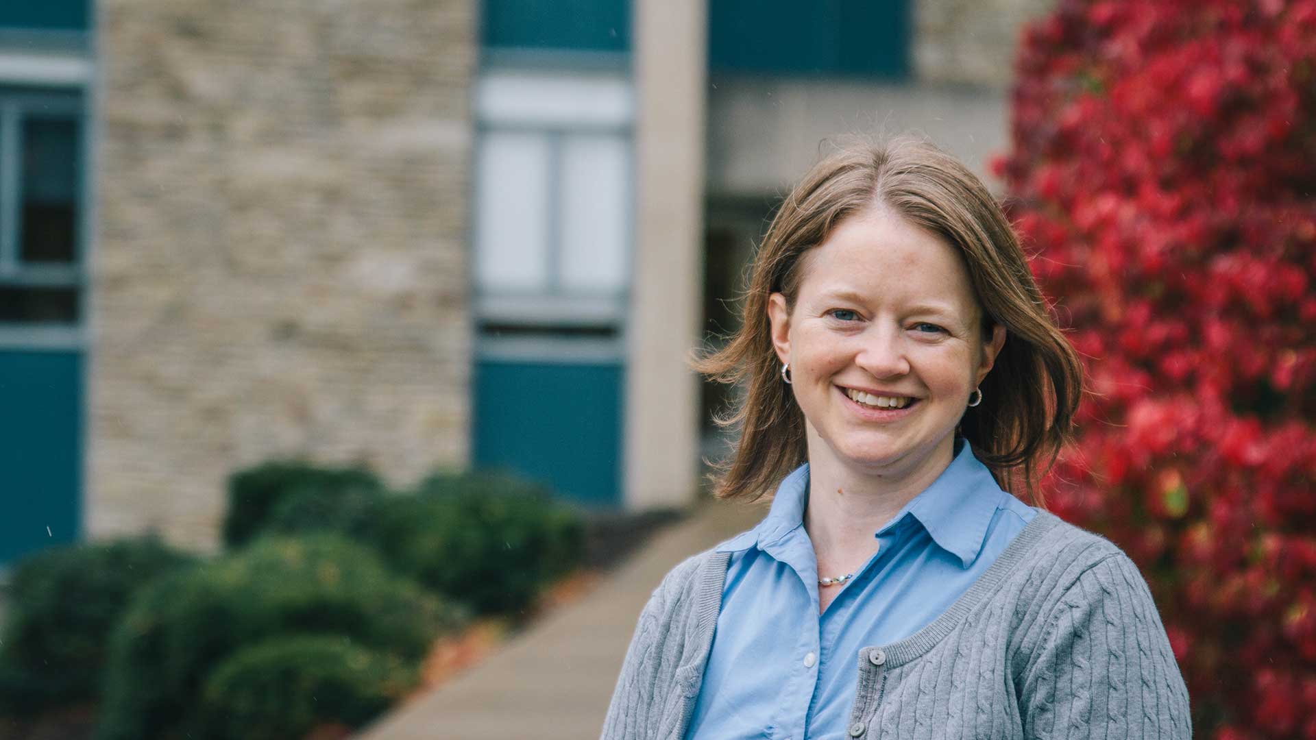 Jill Jordan smiling in front of Paine Science Center