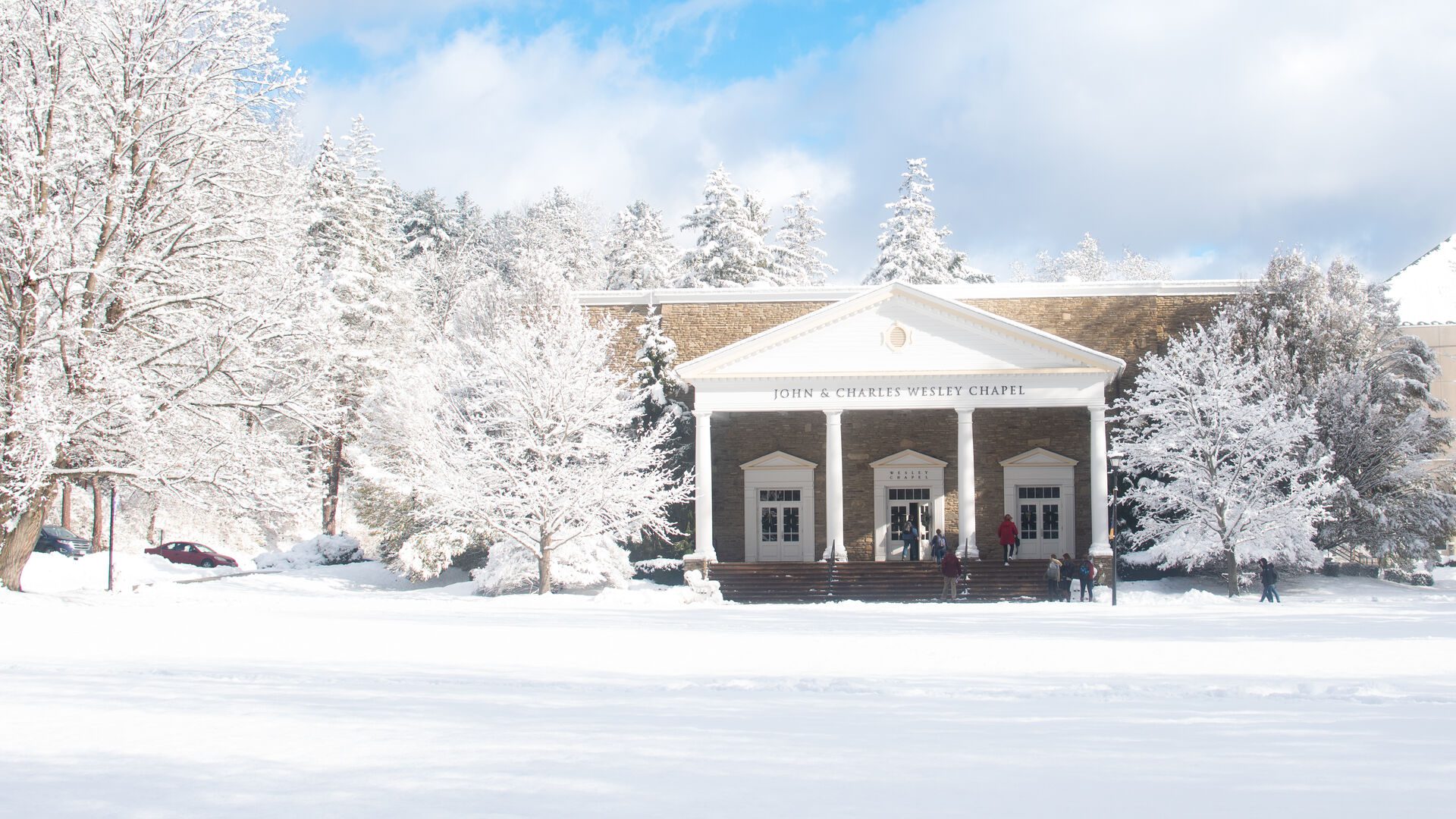 Houghton's Wesley Chapel covered in snow during the winter.