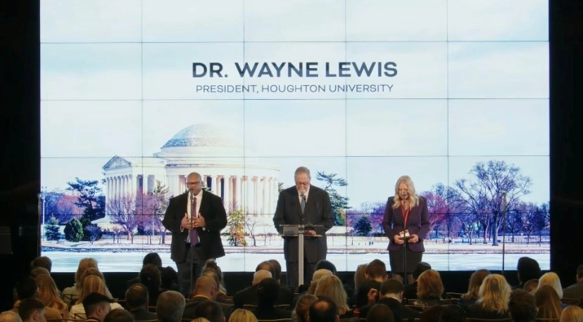 Houghton UniversityPresident, Wayne Lewis on stage with two others during National Gathering for Prayer and Repentance in Washington D.C.