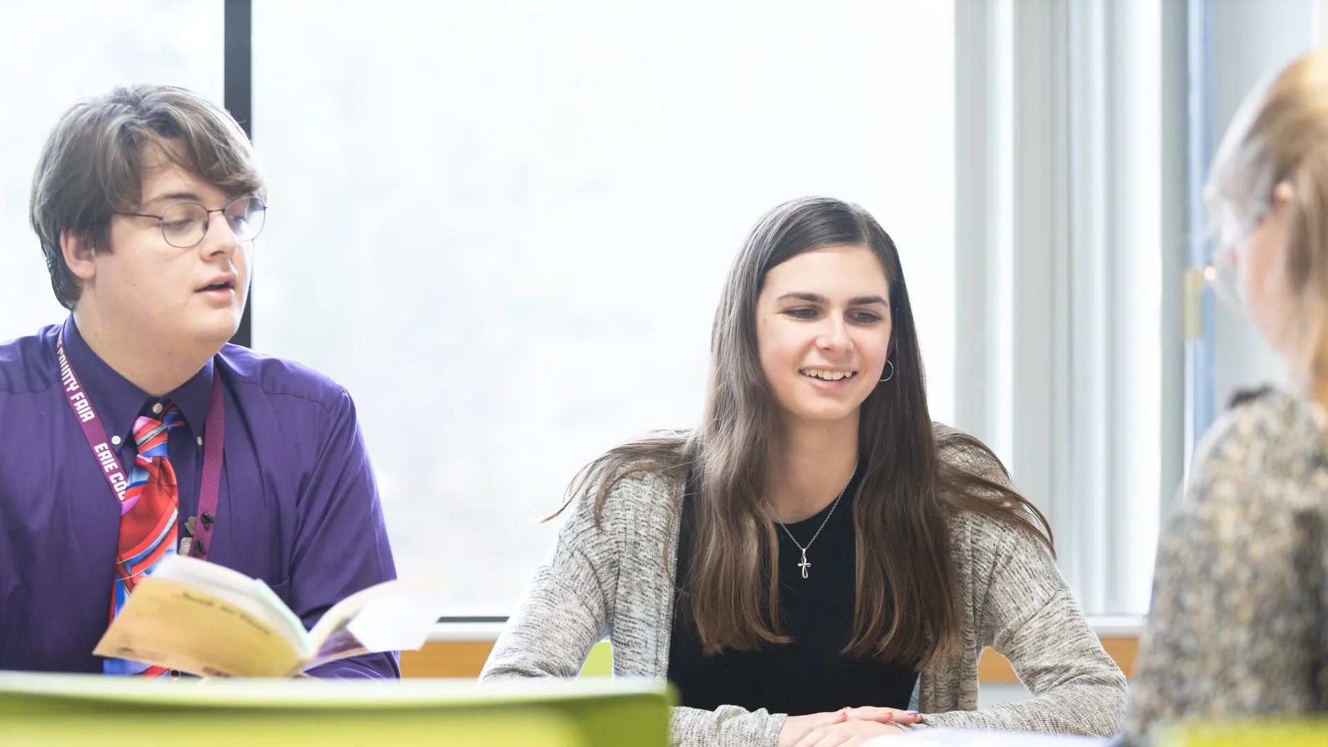 Three ����ר�� education majors sitting at table together.