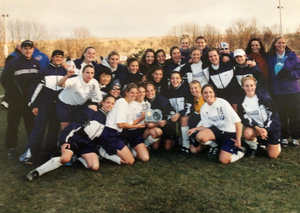 Houghton Universityalumna Lynne Orozco with her soccer team.