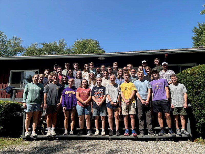 Houghton Universityresidence life staff and RAs standing for group photo.
