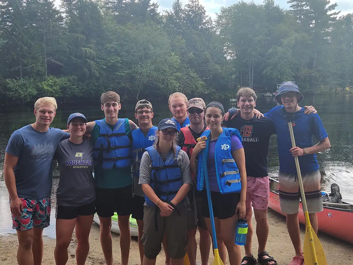 Houghton UniversityHighlander Wilderness Adventures student with lifejackets on.