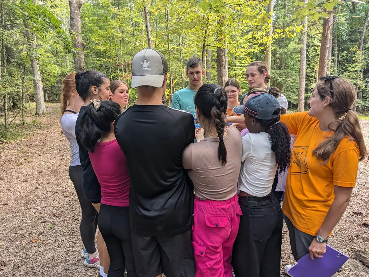 Houghton Universityinterconnect students working on group challenge activity.