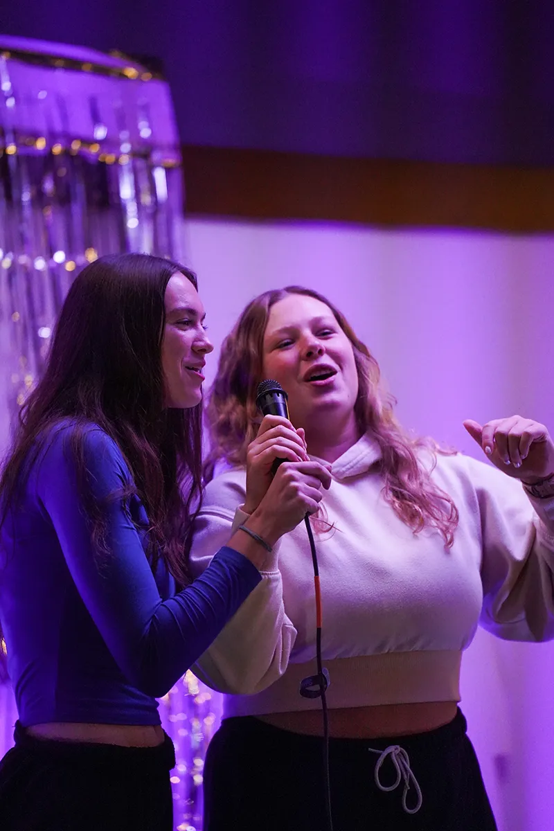 Students singing at SPOT