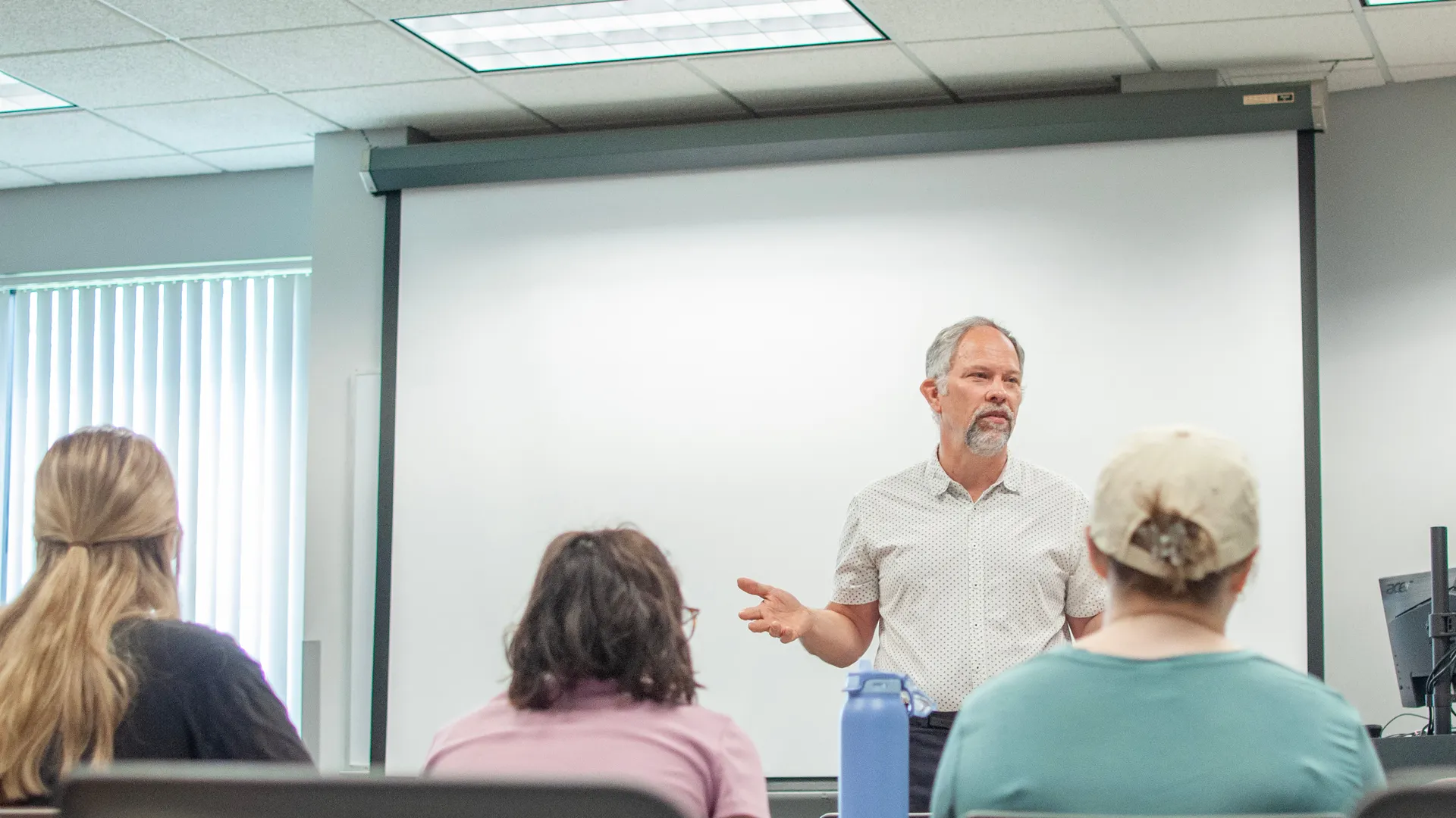 Houghton UniversityProfessor Jonathan Gates teaching in a classroom