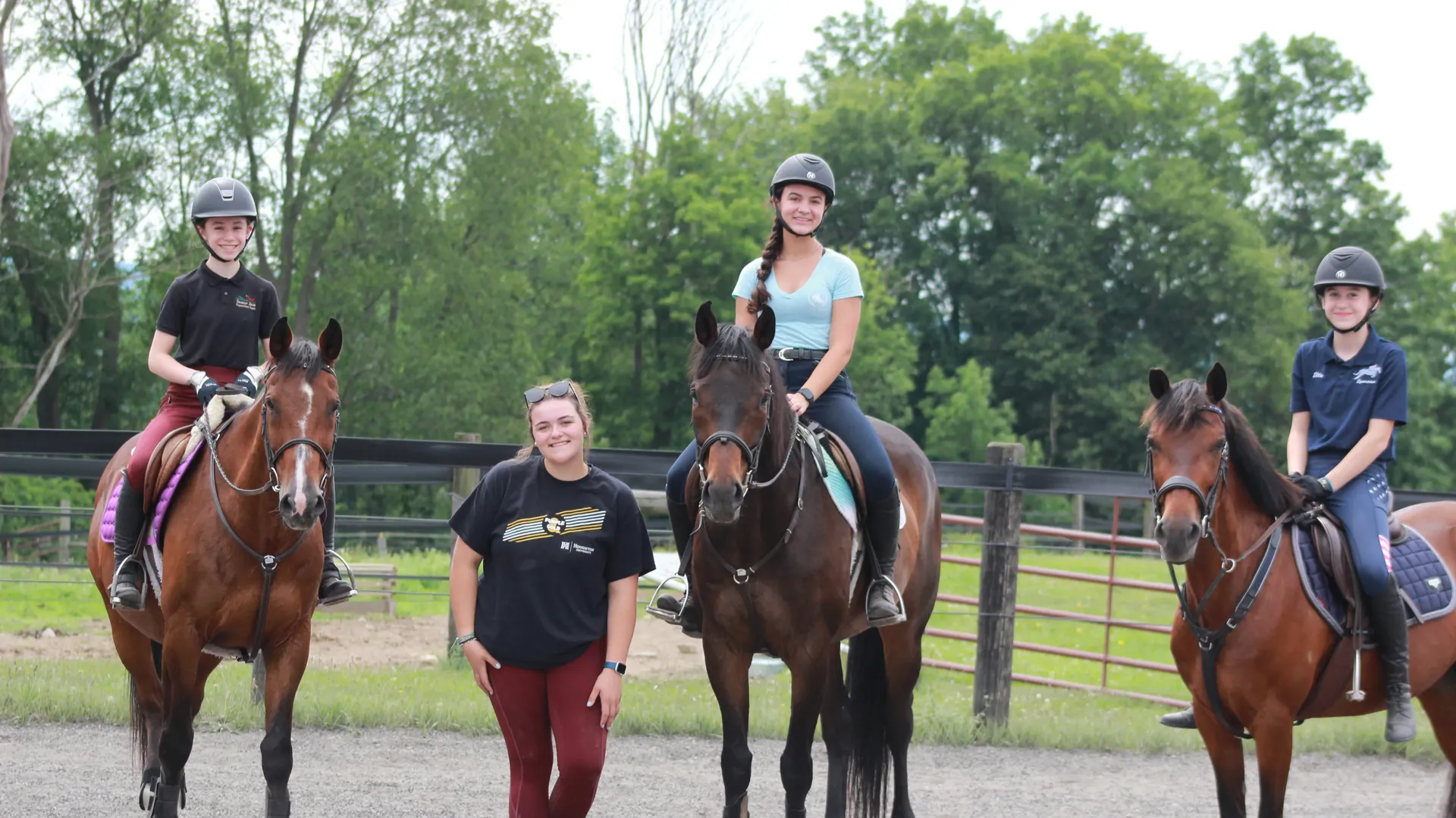Students on horses at the equestrian center