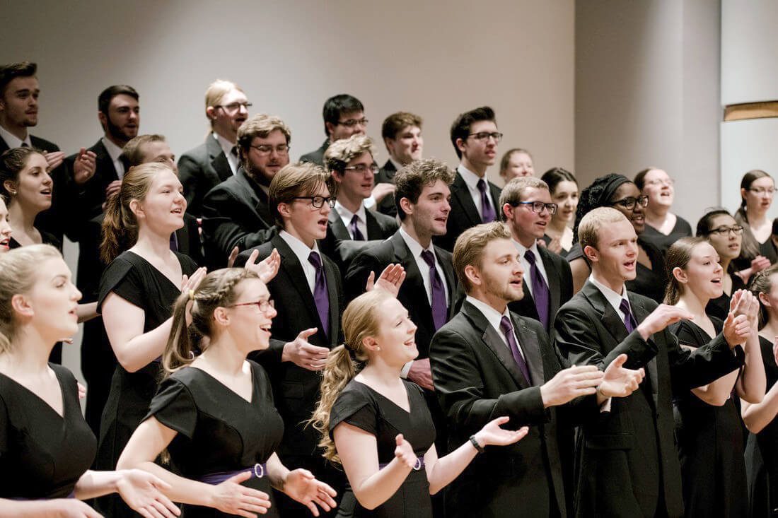 Houghton's choir singing during a tour.