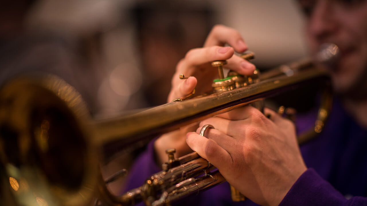 music student playing trumpet