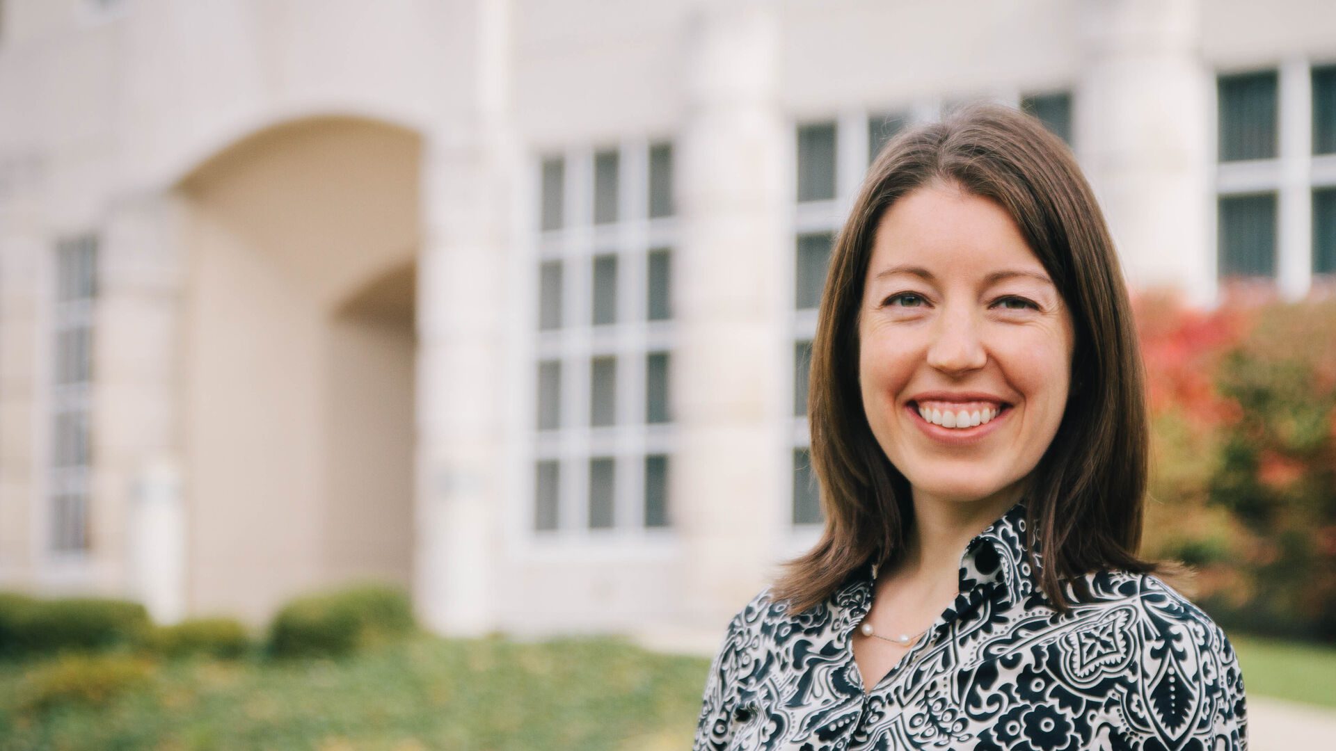 Carrie Magin Smiling at Camera Outside