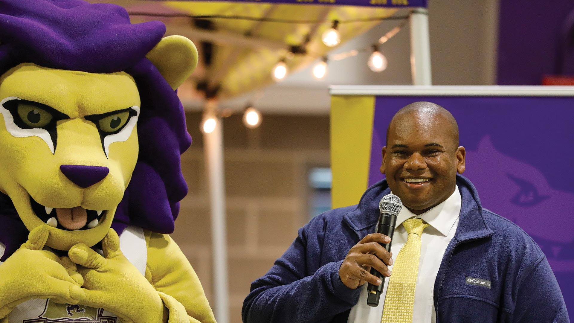 President Lewis with Luckey the mascot during Homecoming weekend at Houghton.