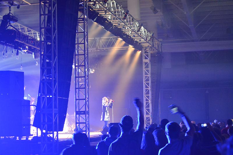 Musician singing on stage at Kingdom Bound in Western NY.