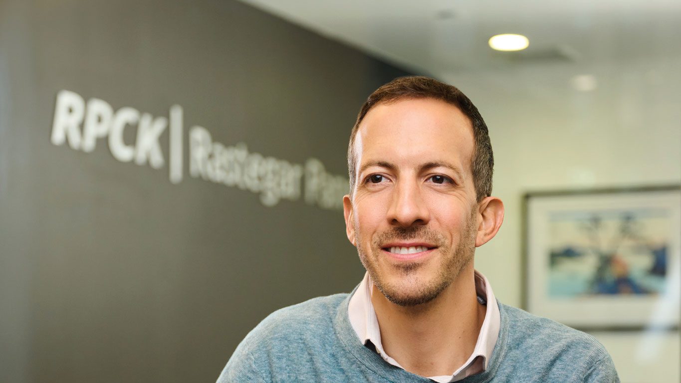 Houghton alumnus Tom Scriven at his place of work, RPCK.