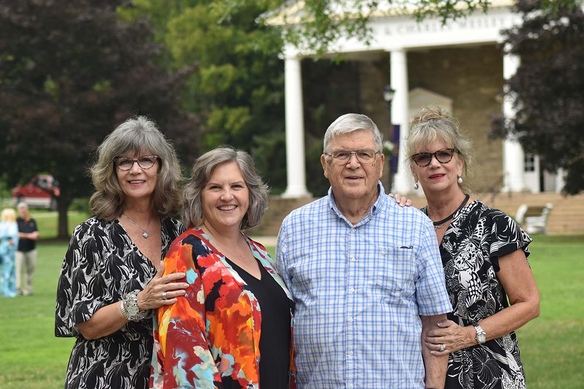 Four Houghton alumni at the Summer Alumni Reunion.