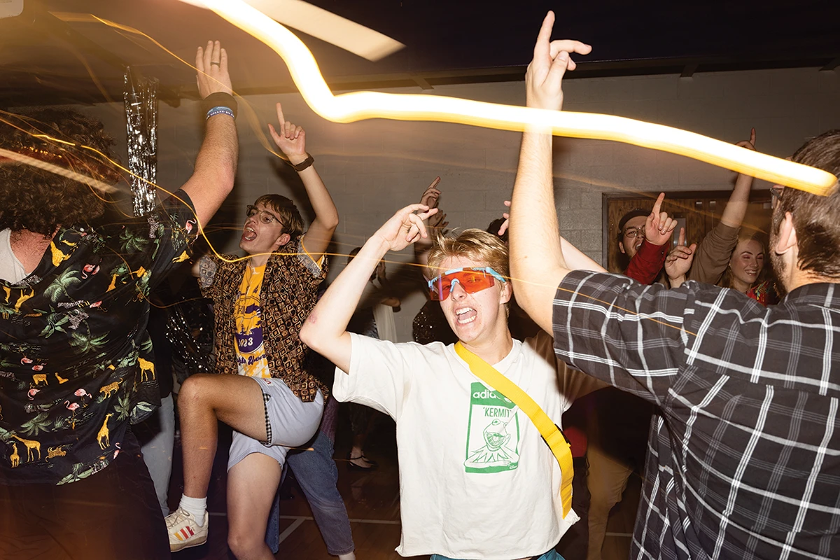 Houghton students dancing during 80s dance night.