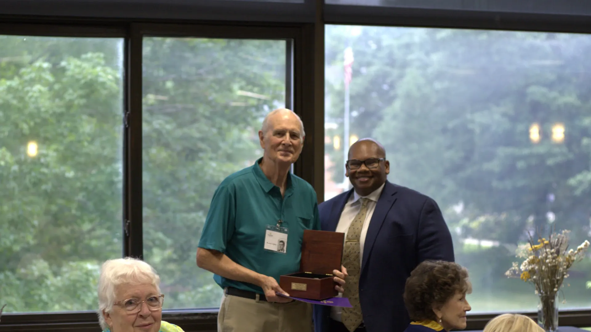 Wayne Adams and Wayne Lewis smiling together